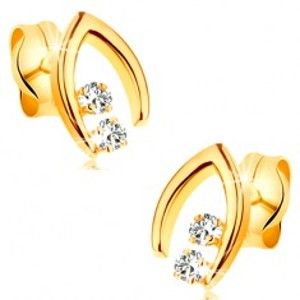 Šperky eshop - Diamantové náušnice v žltom 14K zlate - dvojica briliantov v špicatej podkovičke BT177.11