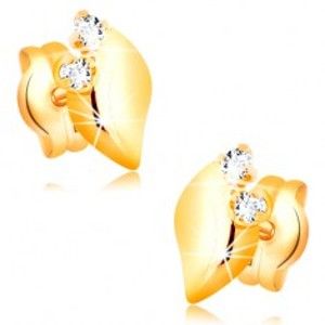 Šperky eshop - Diamantové náušnice zo žltého 14K zlata - dva číre brilianty, lesklý lístoček BT501.21