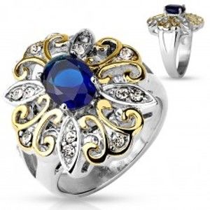 Šperky eshop - Mohutný prsteň z ocele 316L, veľký dvojfarebný kvet, tmavomodrý oválny zirkón M07.21 - Veľkosť: 51 mm