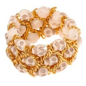 Šperky eshop - Náramok, elastický, splietaná retiazka zlatej farby, lebky O12.19