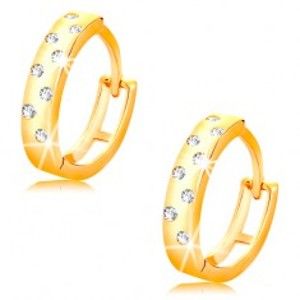 Šperky eshop - Náušnice v žltom 14K zlate - lesklé krúžky posiate čírymi zirkónikmi GG15.16