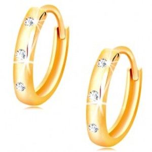 Šperky eshop - Náušnice v žltom 14K zlate - malé lesklé krúžky zdobené čírymi zirkónmi GG15.15