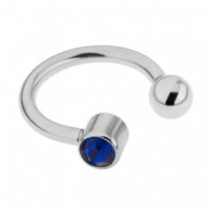 Šperky eshop - Oceľový piercing do obočia striebornej farby, tmavomodrý kamienok PC07.25