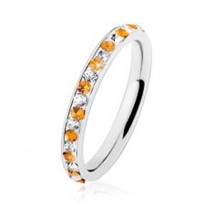 Šperky eshop - Oceľový prsteň striebornej farby, číre a oranžové zirkóniky, biela glazúra HH17.11 - Veľkosť: 60 mm