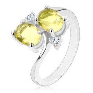 Šperky eshop - Prsteň s úzkymi zahnutými ramenami, dva svetlozelené zirkónové ovály AC10.12 - Veľkosť: 50 mm