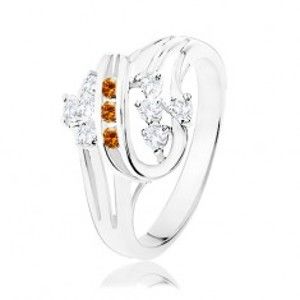Šperky eshop - Prsteň v striebornej farbe, dvojitá špirála s oranžovými a čírymi zirkónmi K6.19 - Veľkosť: 54 mm