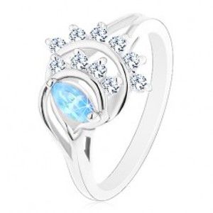 Šperky eshop - Prsteň v striebornom odtieni, modré zrnko, oblúky z čírych zirkónov R44.2 - Veľkosť: 52 mm