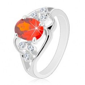 Šperky eshop - Prsteň v striebornom odtieni, oranžový oválny zirkón, zvlnené línie R29.29 - Veľkosť: 51 mm