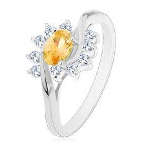 Šperky eshop - Prsteň v striebornom odtieni, žltý zirkónový ovál, číre oblúky AC17.05 - Veľkosť: 56 mm