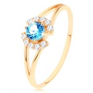 Šperky eshop - Prsteň v žltom 9K zlate - číre zirkónové oblúčiky, okrúhly modrý topás GG65.25/29 - Veľkosť: 55 mm