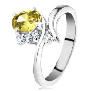 Šperky eshop - Trblietavý prsteň v striebornom odtieni, oválny zirkón v žltej farbe H4.16 - Veľkosť: 54 mm