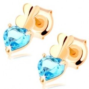 Šperky eshop - Zlaté náušnice 585 - dve malé srdiečka a srdiečkový topás modrej farby GG89.34
