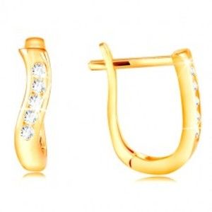 Šperky eshop - Zlaté náušnice 585 - lesklá zvislá vlnka zo žltého zlata, pás čírych zirkónov GG210.18