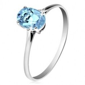 Šperky eshop - Zlatý prsteň 585 s oválnym ligotavým topásom modrej farby, tenké ramená GG204.52/59 - Veľkosť: 51 mm