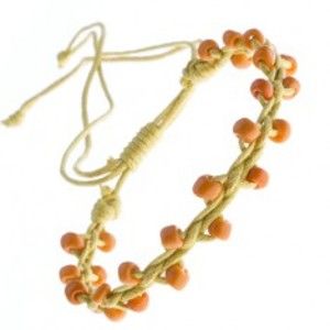 Šperky eshop - Žltý náramok priateľstva - lesklé oranžové korálky Z11.6